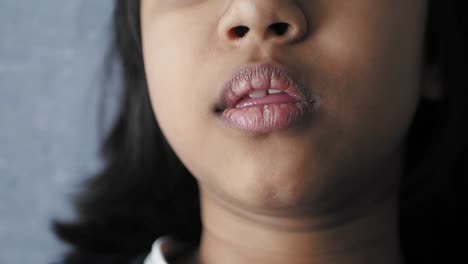 child yawning closeup