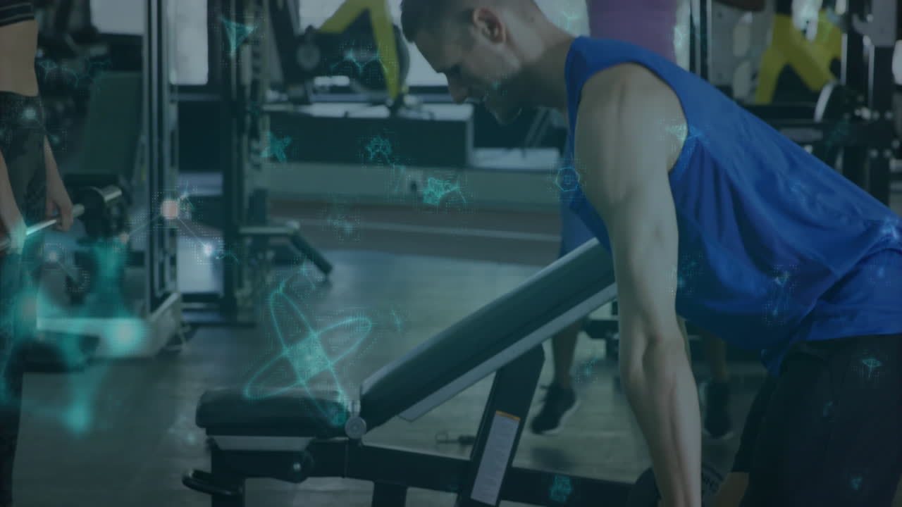 People exercising in gym with digital fitness data animation overlay