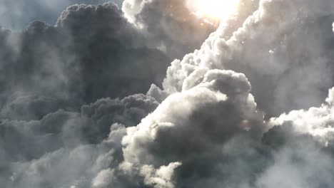 the sun was shining brightly against the thick, dark cumulonimbus clouds