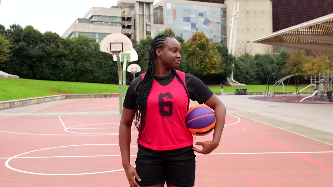 Young Female Basketball Player on Outdoor Court