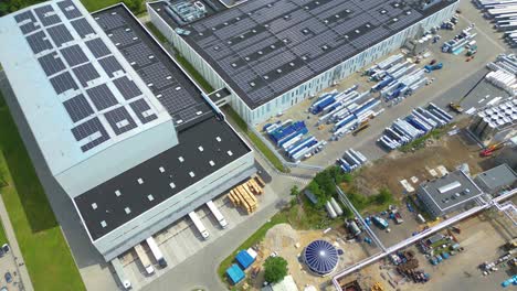 Aerial-view-of-modern-storage-warehouse-with-solar-panels-on-the-roof