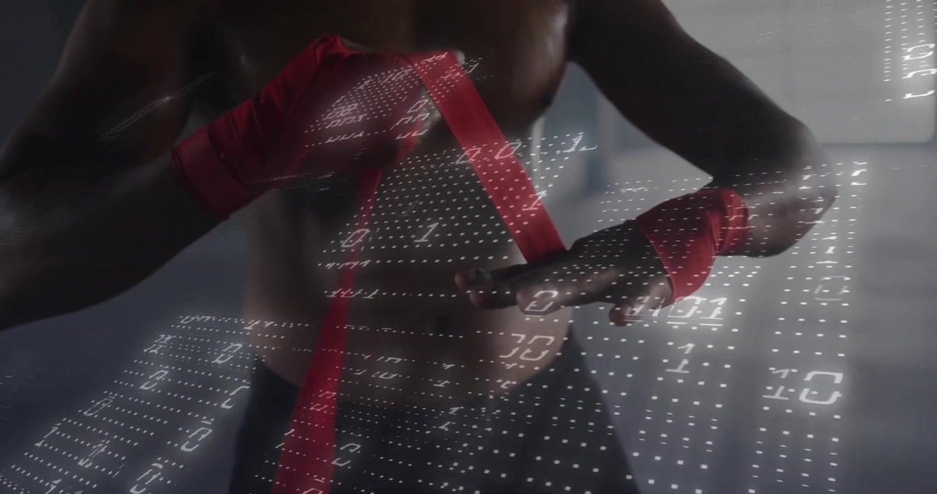 Athlete holding red wrap and wrapping fists for boxing training in gym with shifting binary grid