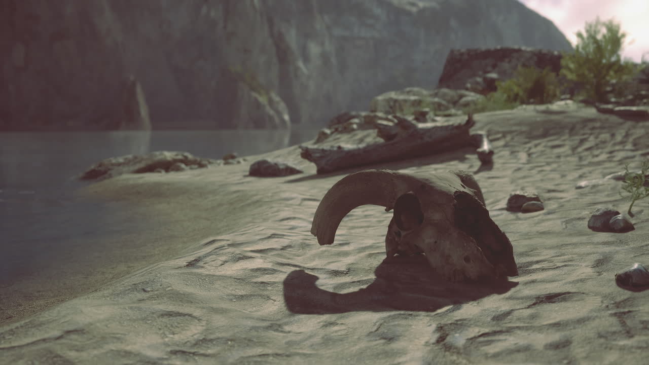 Ancient artifact resting on sandy shore at rivers edge during twilight