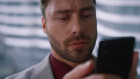 Focused caucasian business man texting