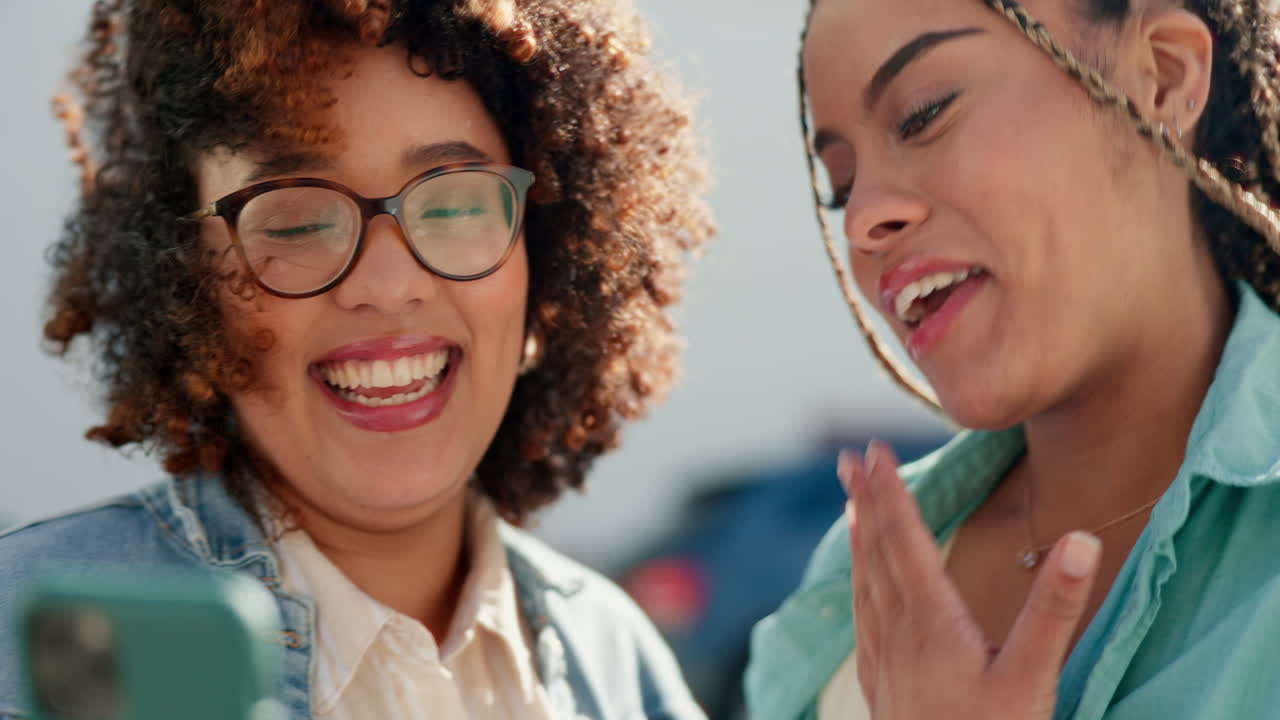 Laughing, phone and friends in a city online