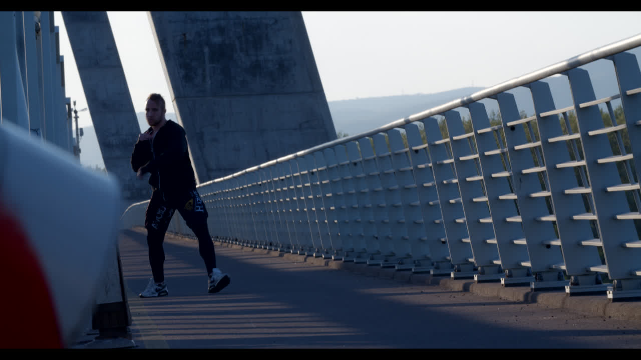 Man Working Out on a Bridge