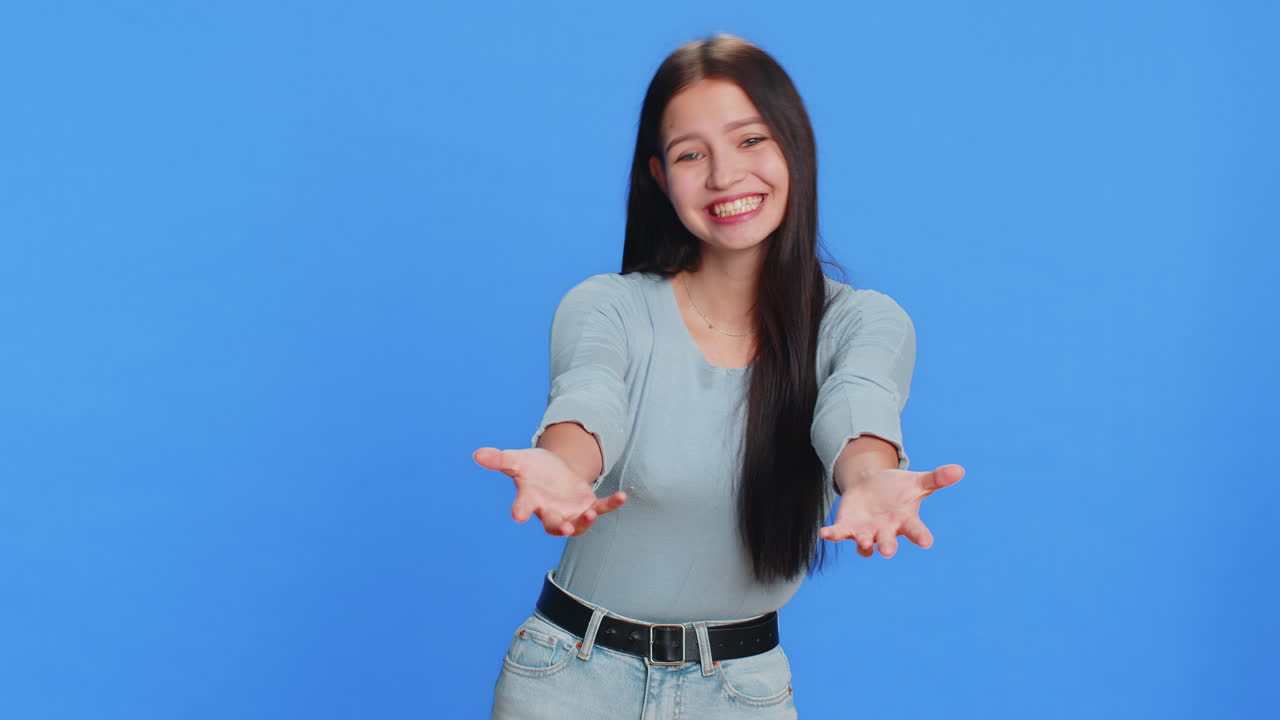 Happy woman opening hands free gifts presents for you charity donation sharing love surprise award