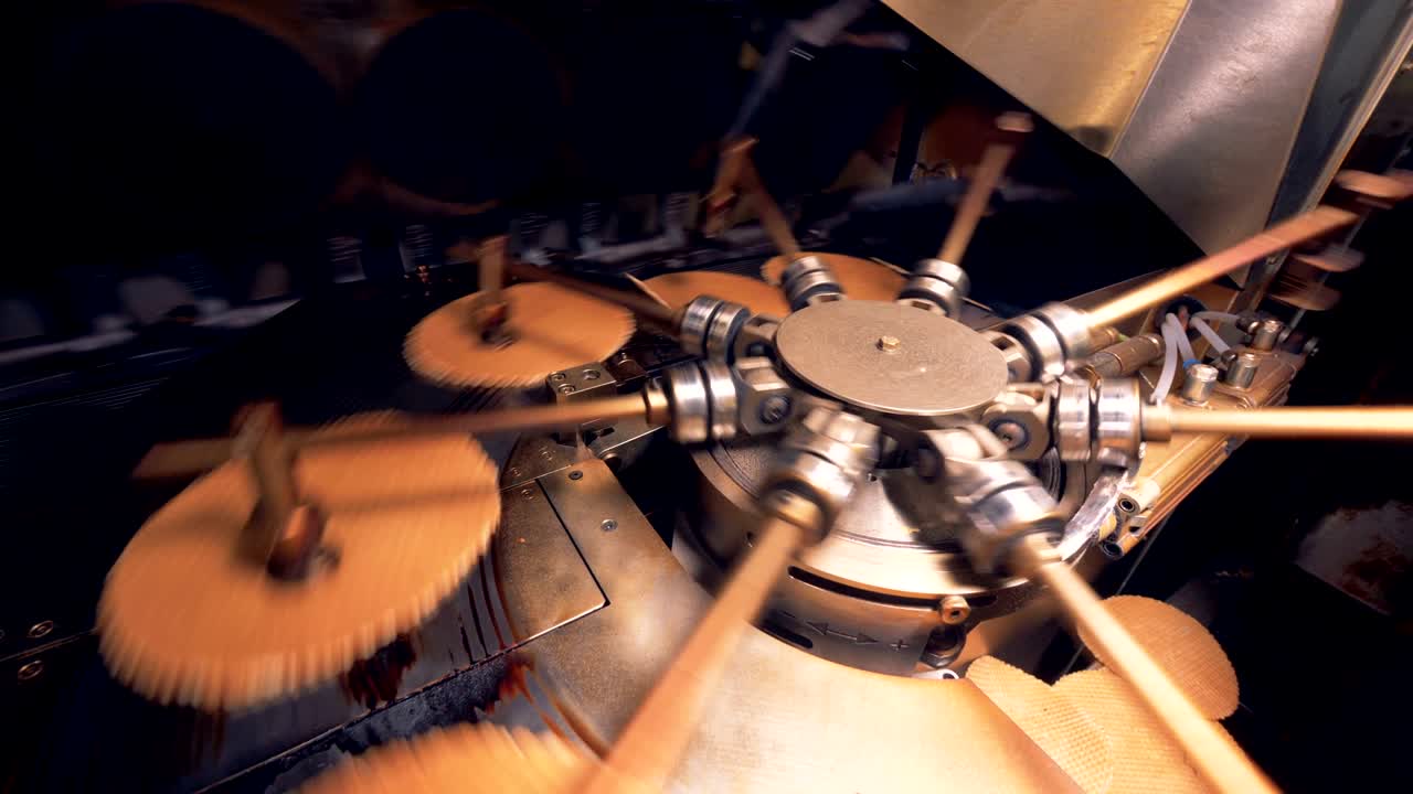 Working rotary conveyor is relocating round wafer layers