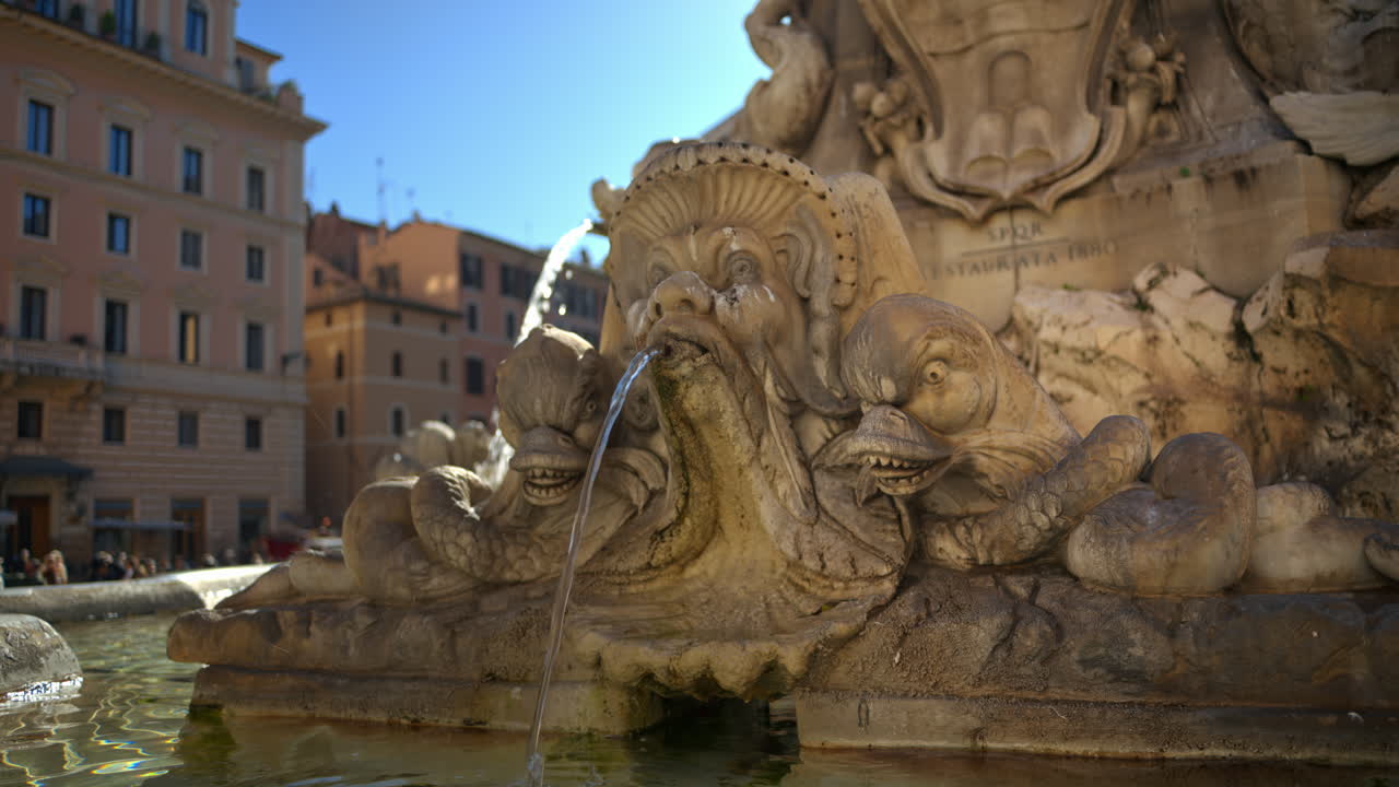 Close up view of the Fountain of the Pantheon in sunlight. Slow motion