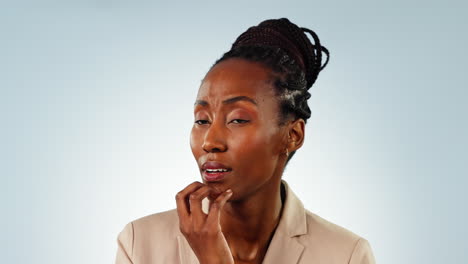 Thinking, doubt and face of black woman in studio