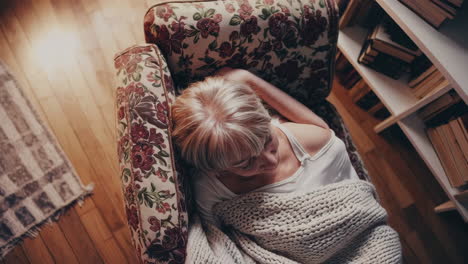 woman sleeping in an armchair