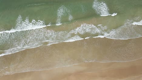 Pleasant-clean-white-rock-beach-Portrush-Northern-Ireland-aerial