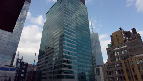 Aerial-birds-eye-overhead-top-down-view-of-tall-office-of-apartment-buildings