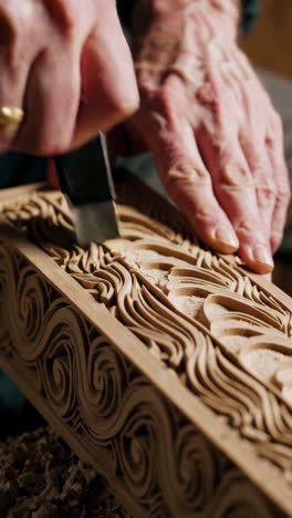 close-up of wood carving in progress