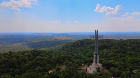 drone shot flying past the cruz de santa ana in misiones, argentina