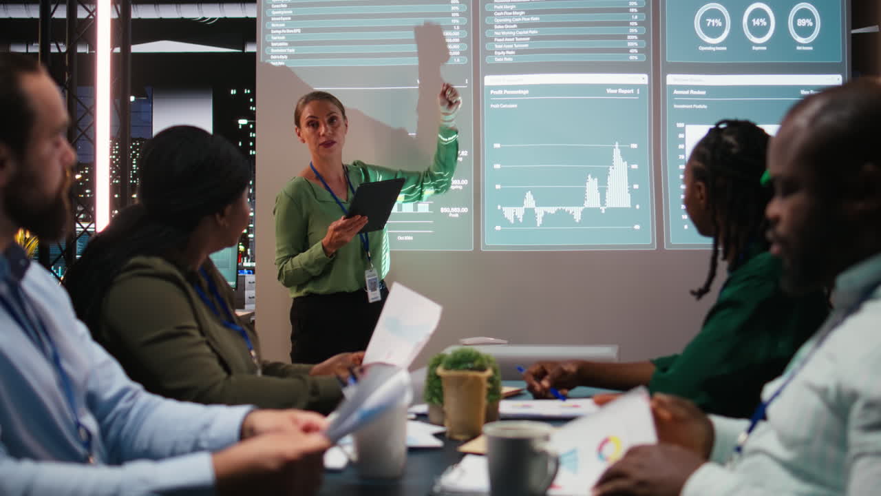 Team of company analysts review feedback on data insights