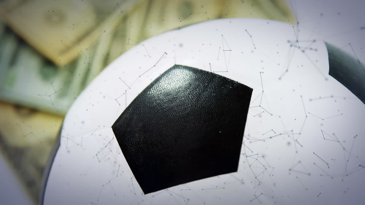 은행권과 축구 위에 있는 모양의 애니메이션