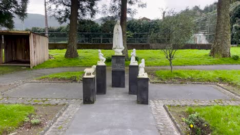 close-view-of-view-of-Sete-Cidades-in-the-Azores,-featuring-the-statues-of-Our-Lady-and-the-Little-Shepherds