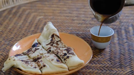 arabic coffee and middle eastern fatayer stuffed pie. traditional food