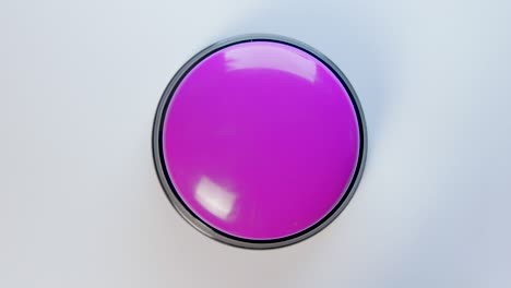 young woman pushing purple button with a finger and palm of her hand. press a round glossy button, top view. activation, launching something. turn on and off.