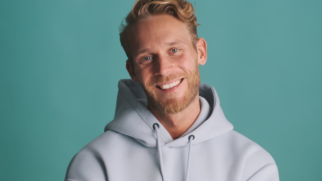 Handsome man smiling and posing