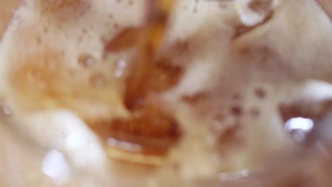 refreshing iced tea preparation kitchen food photography bright atmosphere close-up beverage concepts