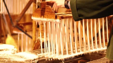 hand-dipping candles in wax at sovereign hill