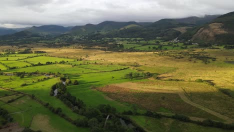 valley in lake district braithwaite sunrise clouds over surrounding hills drone footage