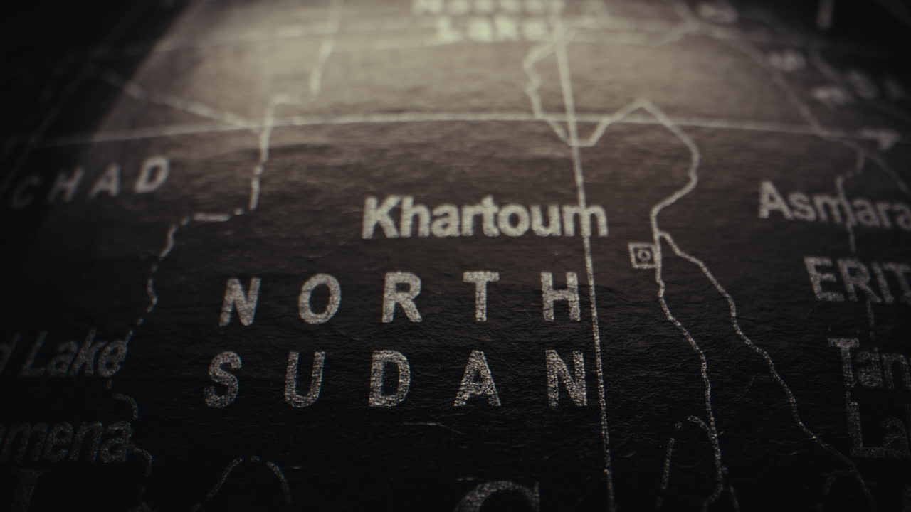 Close-up of a world map, focusing on North Sudan and Khartoum.