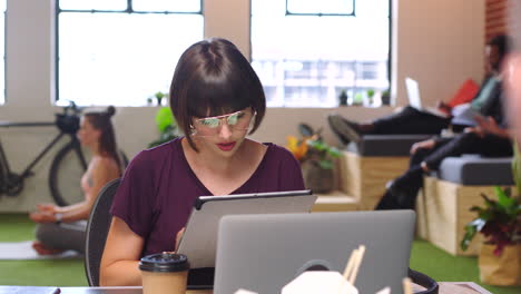 woman in modern office discussing work