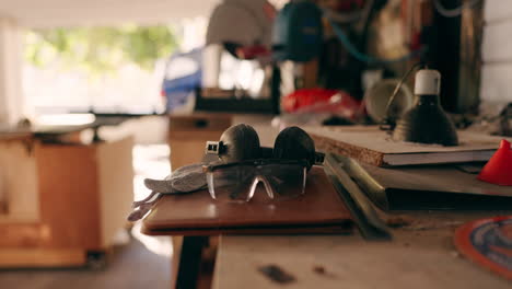 safety goggles, table and wood tools