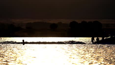 water sports activities in boulder reservoir during sunset