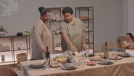 a family enjoys a delicious meal together at a dining table.