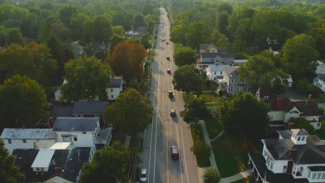 drone shot following cars of downtown palmyra new york