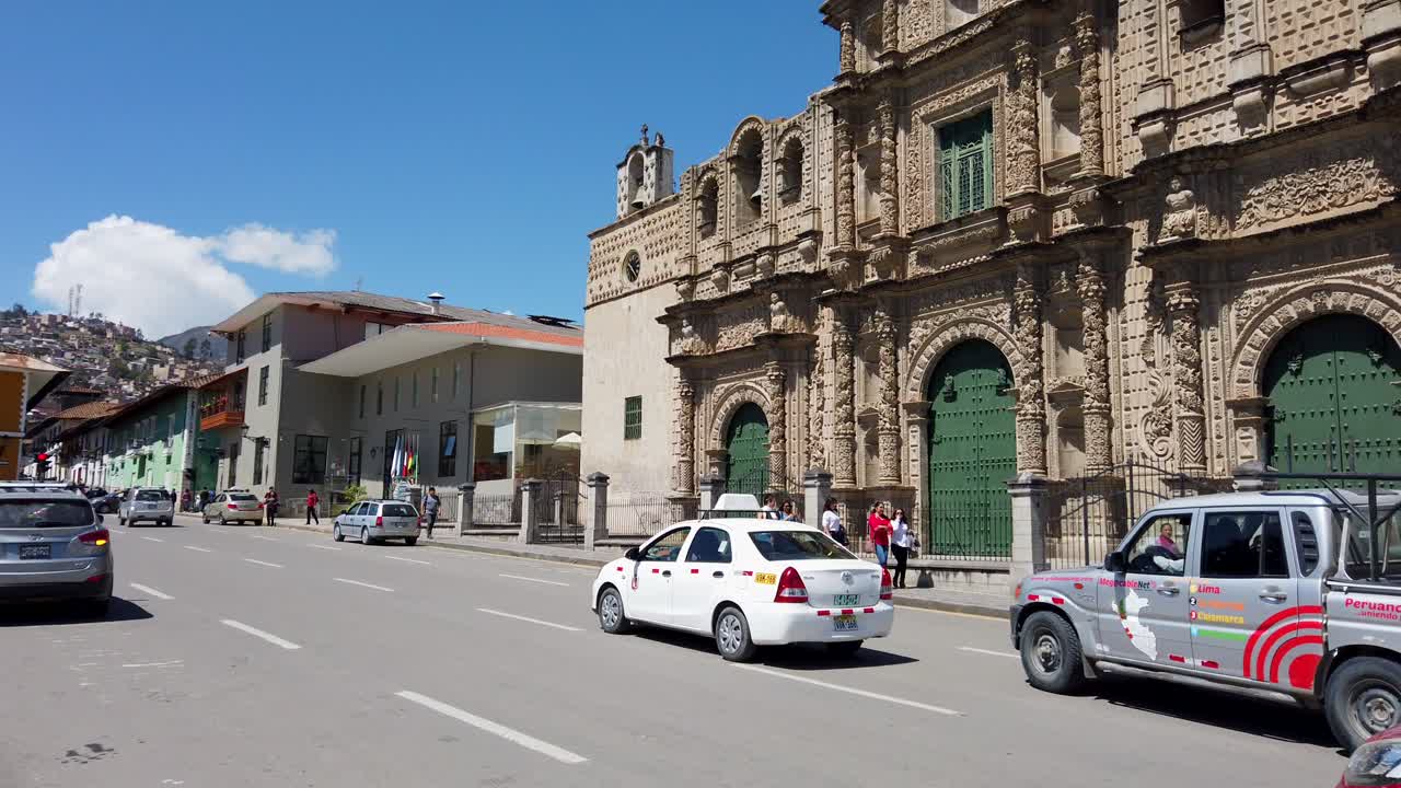 Baroque Style Facade Of Cajamarca Cathedral In Cajamarca, Peru As Seen From Plaza de Armas Main Square. slow motion