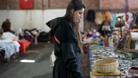 woman browsing at a flea market