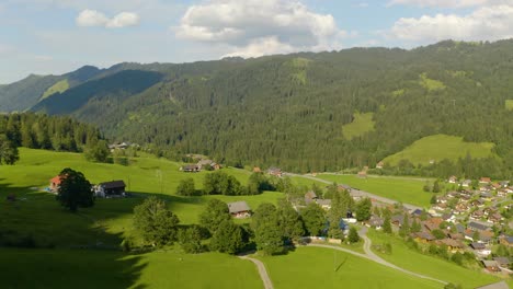 Pedestal-Up-Reveals-Schwyz,-Switzerland-in-Swiss-Alpine-Mountains