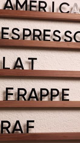coffee menu board with hand