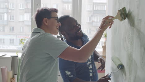 friends painting a room