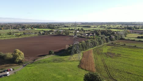 Strommast-Übertragungsturm-UK-Landschaft-Drohne-Erschossen