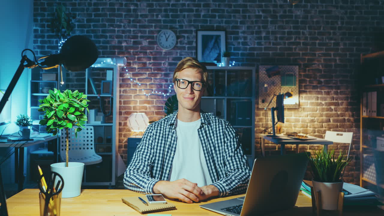 Young Man Working Late at Night