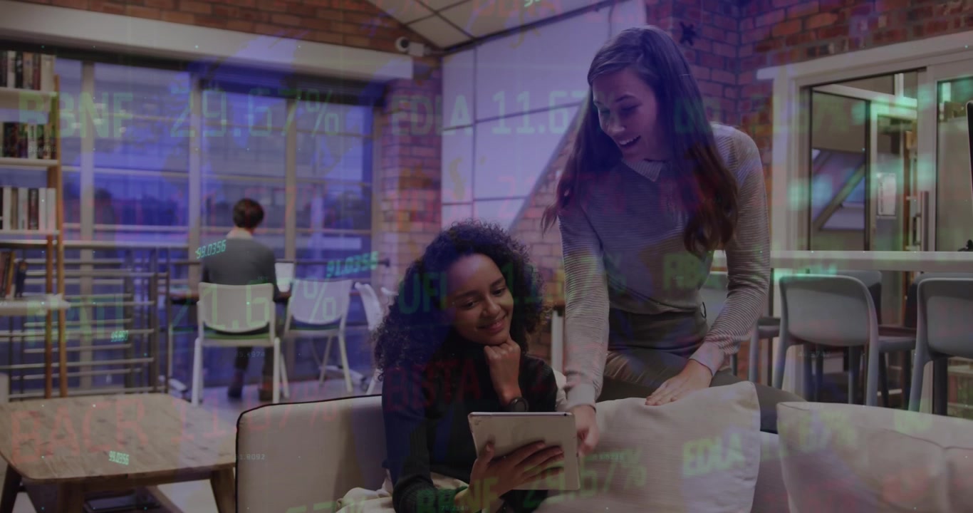 Animation of stock market data processing over diverse female colleagues discussing at office