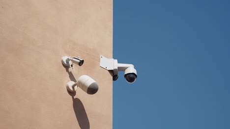 security cameras on a building wall