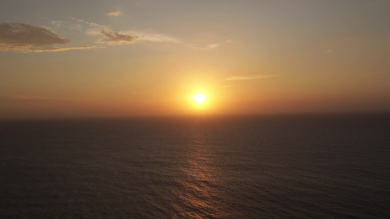 Sunset time-lapse sun set over Caribbean Sea Colombia coastline horizon