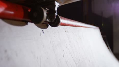 man practicing skateboarding in skateboard arena 4k