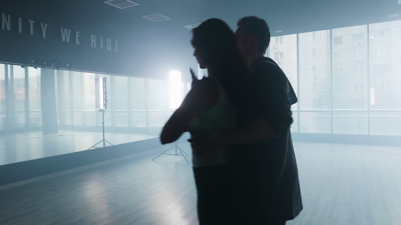 Couple Dancing in Dance Studio Silhouette