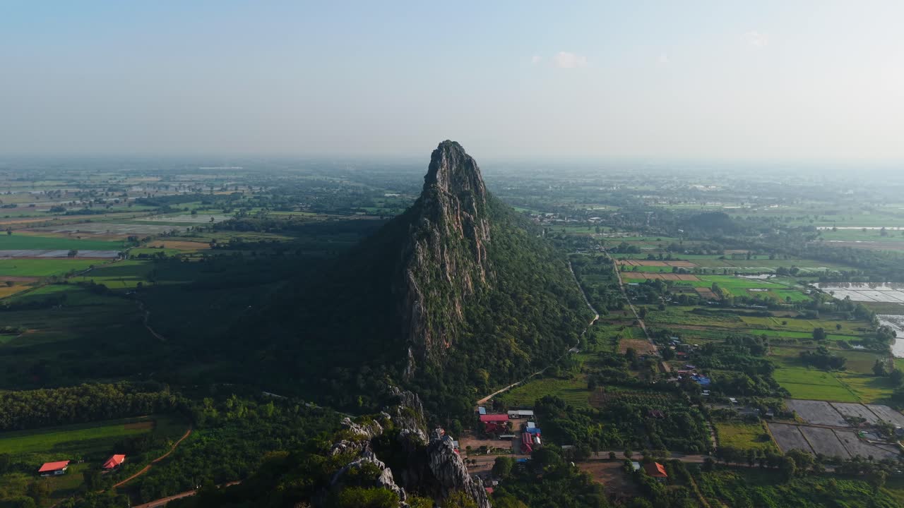 Aerial View of a Mountain and Surrounding Farmland
