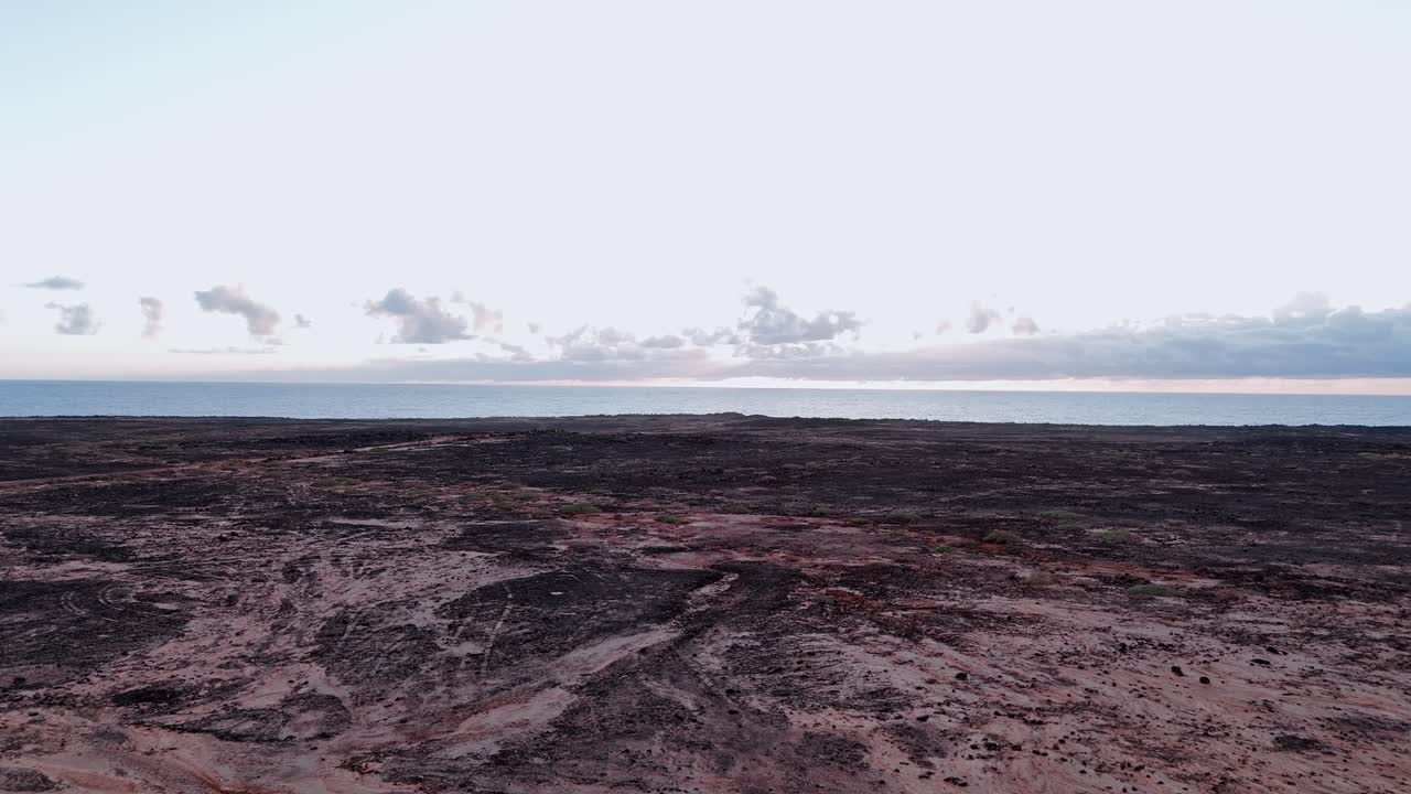 Breathtaking aerial drone footage capturing the stunning desert in Charcones natural pools along the rugged coastline of Lanzarote, Canary Islands.