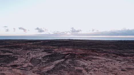 breathtaking aerial drone footage capturing the stunning desert in charcones natural pools along the rugged coastline of lanzarote, canary islands.