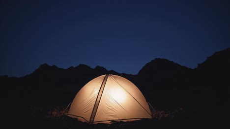 camping tent under night sky